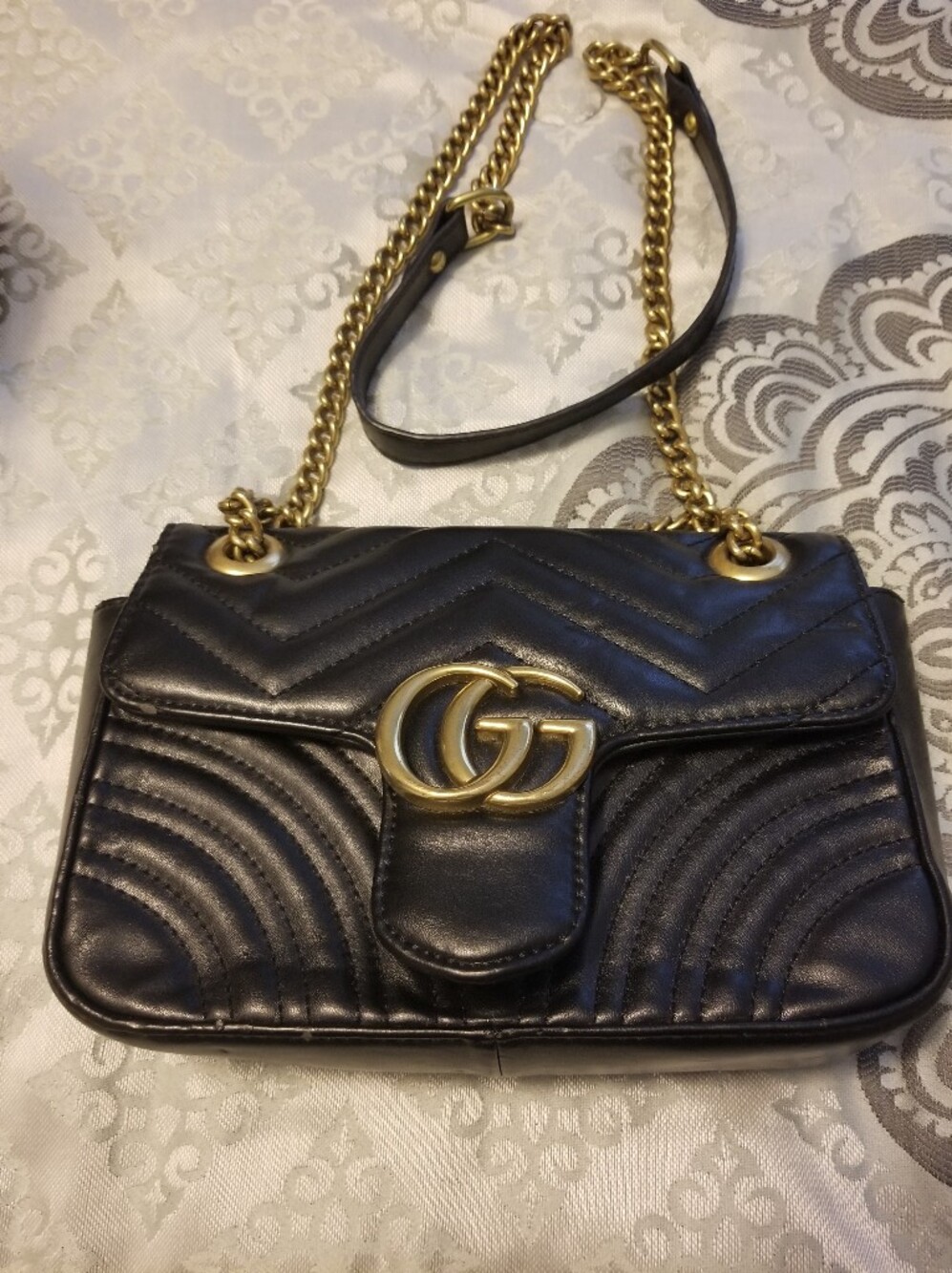 Black Quilted Shoulder Bag with Gold Double-G Accent